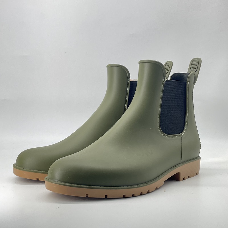 Minimalist matte green short rain boots with elastic and leather style