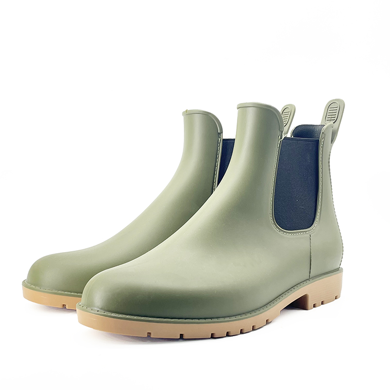 Minimalist matte green short rain boots with elastic and leather style